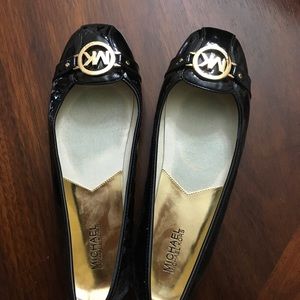 New Michael Kors black patent flat shoes.
